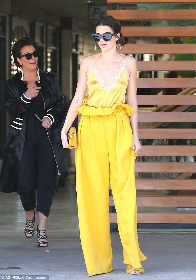 Sexy ray of Sunshine! Kendall Jenner is unmissable in a Bright Yellow Outfit