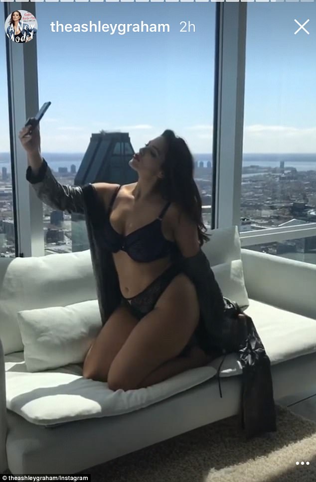 What a view! Ashley Graham poses up a storm while modelling her own sexy underwear against Montreal skyline