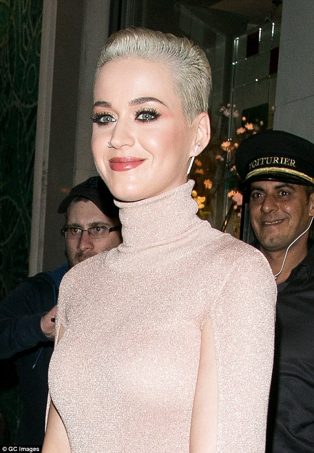 French style! Katy Perry rocks red lip color and a pretty shimmery pink dress as she dines out in Paris