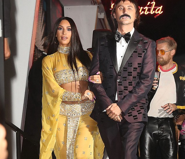 Kim Kardashian and Jonathan Chaben dress as Sonny and Cher