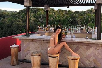 Cheeky! Bikini-clad Kourtney Kardashian sizzles as she showcases peachy backside during Mexican trip