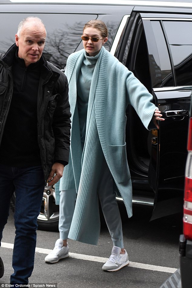 Gigi Hadid covers up with a knitted outfit on her way to a photo shoot in New York’s Tribeca neighborhood