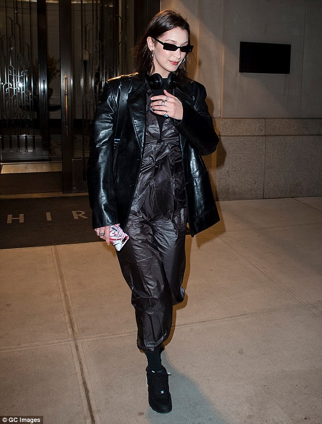 Bella Hadid looks like she stepped out of The Matrix in all-leather outfit and dark shades in NYC