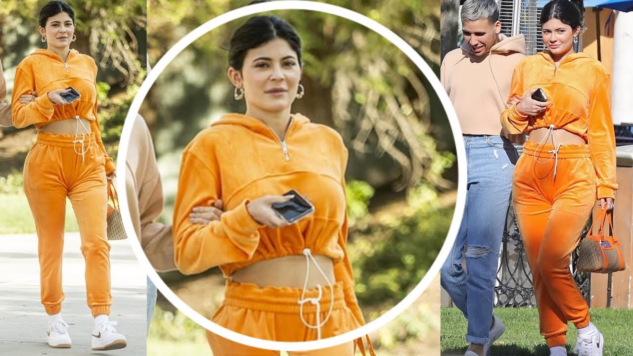 Kylie Jenner Flashes Her Midriff In Orange Tracksuit As She Goes Makeup Free For Lunch In La
